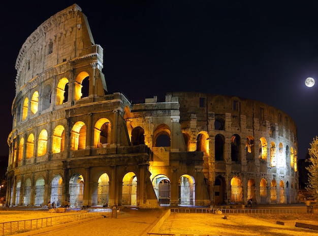 Premium Photo | The colosseum, the world famous landmark in rome. night ...