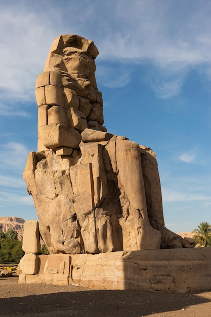 Premium Photo Colossi Of Memnon Luxor Thebes Against The Background Of Dawn In The Egypt