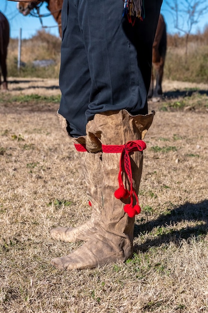 Premium Photo | Colt boots from argentine gaucho vertical photo