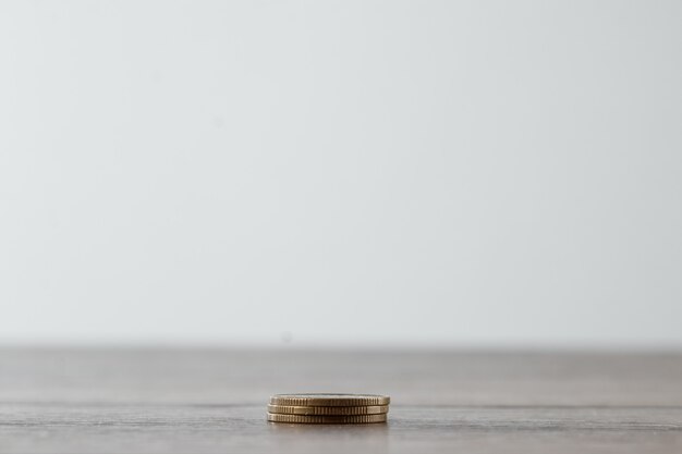 Premium Photo Columns Of Gold Coins Piles Of Coins Arranged On White