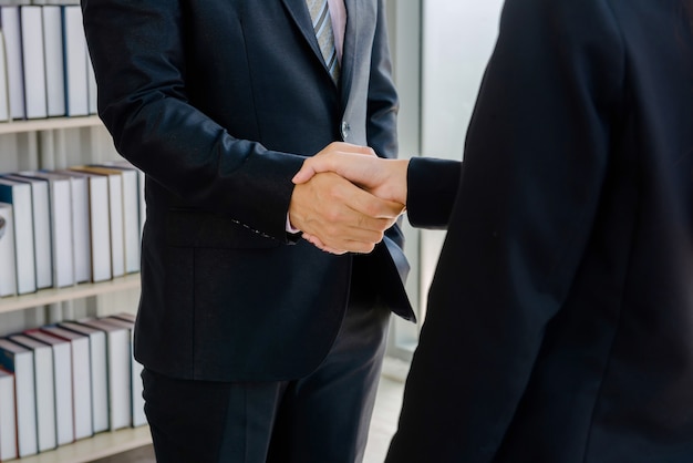 Premium Photo | Company employees shake hands