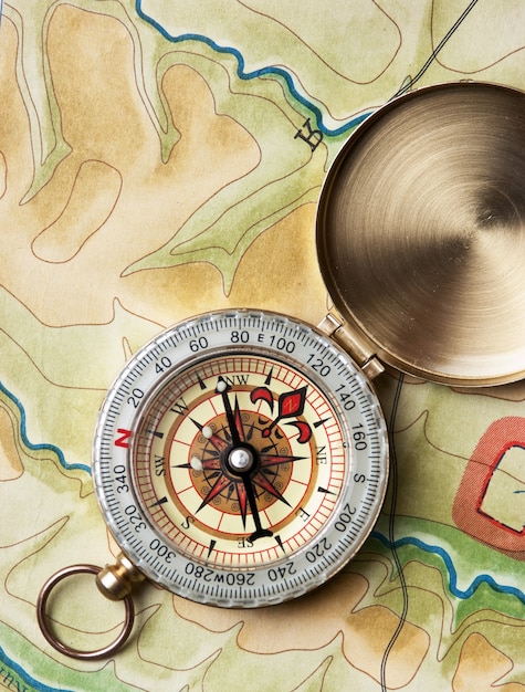 Premium Photo Compass On A Map