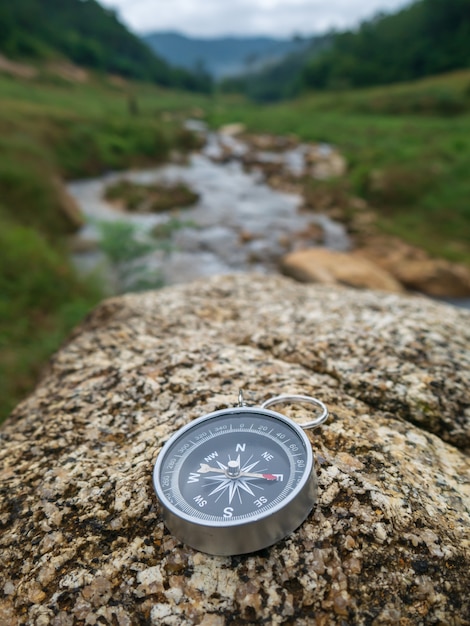 Premium Photo | Compass and wandering concept in the forest