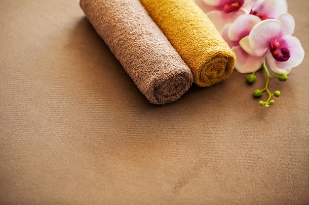 Composition brown towel in hotel room of spa treatment Premium Photo