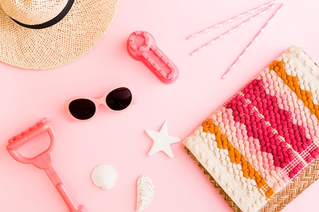 Composition with beach objects on pink background Free Photo