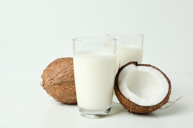 Premium Photo | Concept of coconut milk on white background