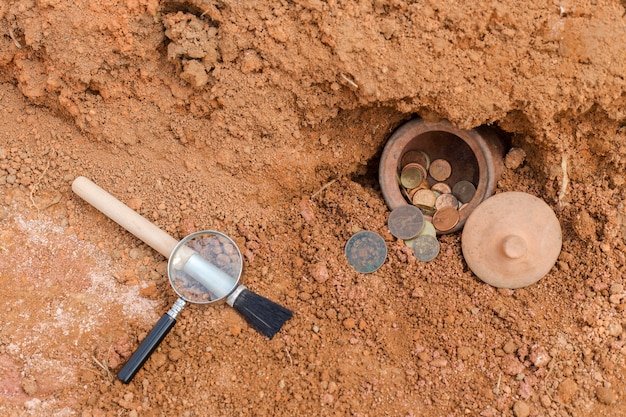 The concept of discovering treasures from underground. Premium Photo