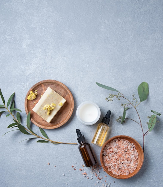 Concept flat lay beauty spa with natural cosmetic products peeling natural soap, oil and mineral sal