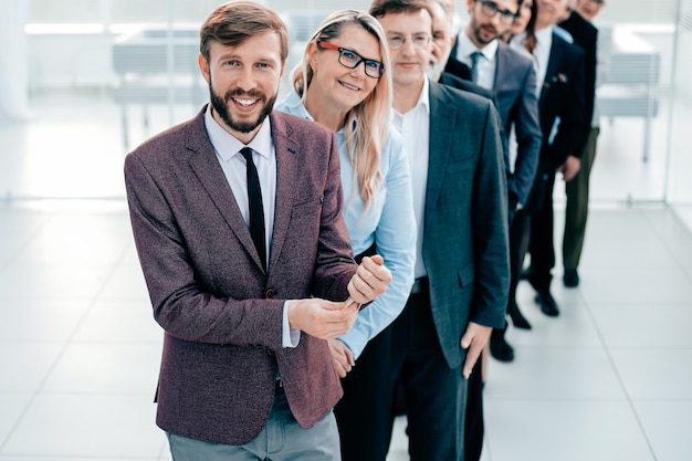 Premium Photo | Confident leader standing in front of the business team