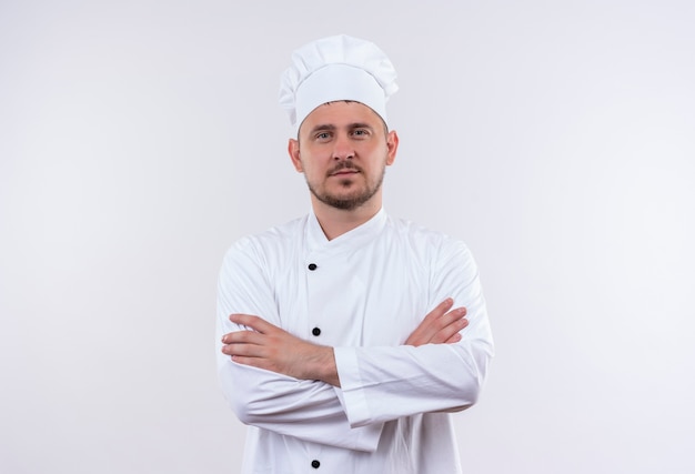 Free Photo | Confident young handsome cook in chef uniform standing ...