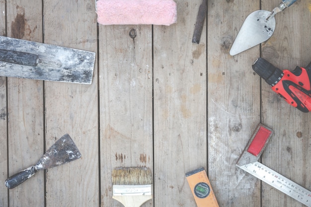 Construction Tools Placed On Wooden Floors Free Photo