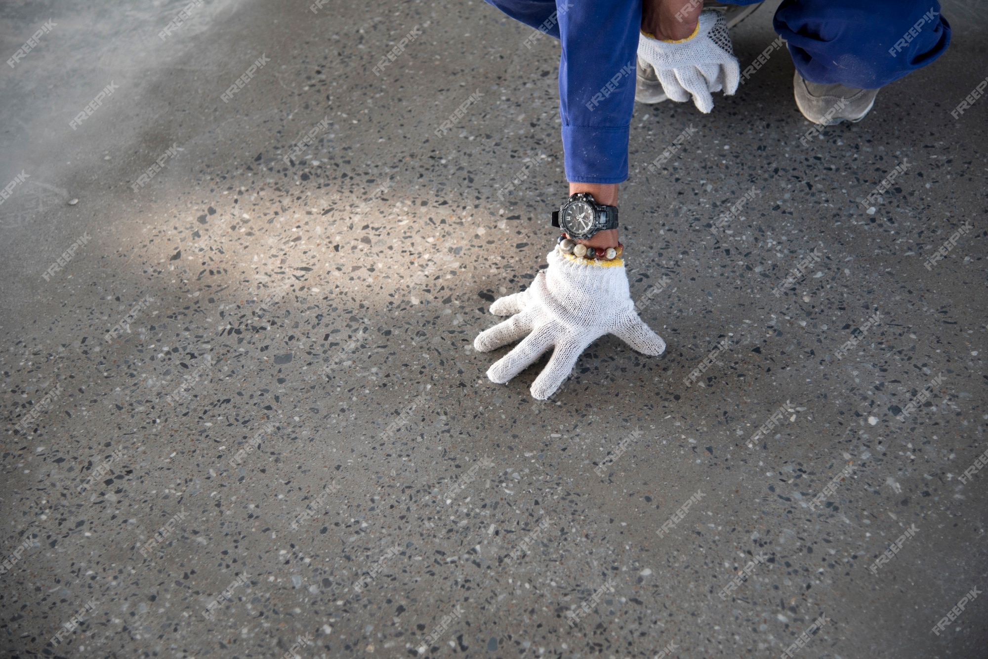 Premium Photo | A construction worker check quality epoxy floor in ...