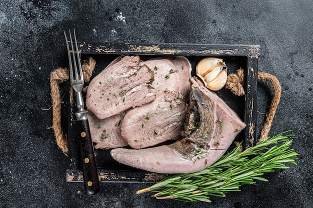 Premium Photo | Cooked Boiled Veal Or Beef Tongue Sliced In A Wooden ...