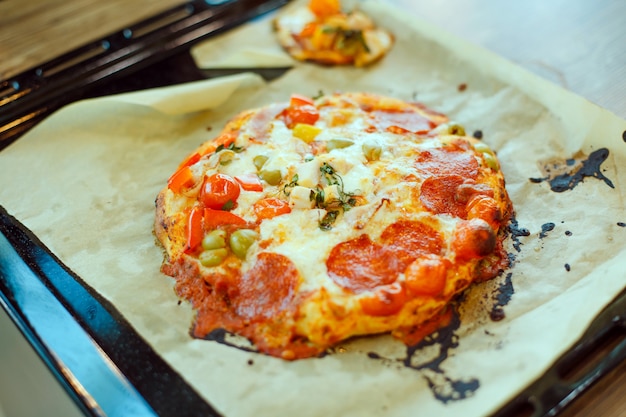 premium-photo-cooked-homemade-pizza-on-a-baking-sheet-on-a-baking-sheet