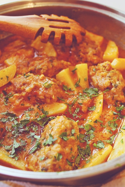 Cooking chicken stew Photo | Free Download