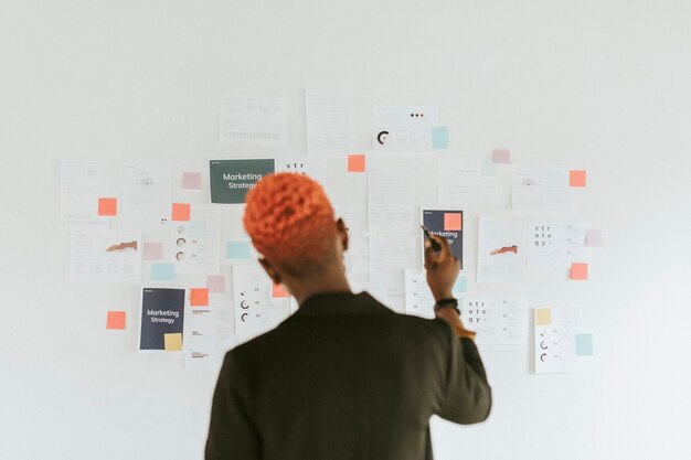 Premium Photo | Cool black businesswoman planning a marketing strategy