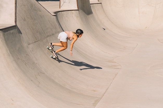 Free Photo | Cool girl with helmet skating