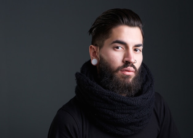 Premium Photo Cool Guy With Beard And Piercings 