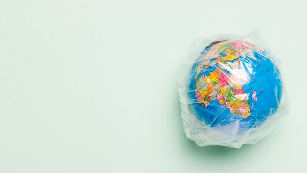 Copy-space globe covered in plastic | Free Photo