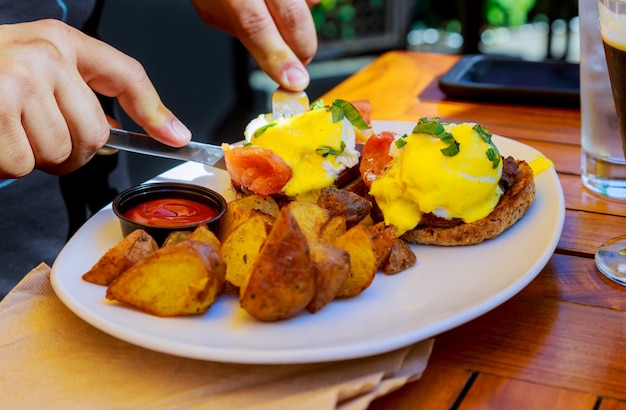 Premium Photo Corned Beef Hash With Broken Fried Egg And Black Pepper