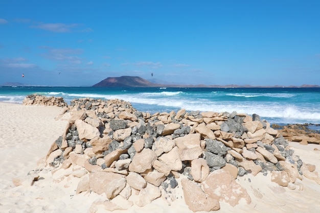 Premium Photo Corralejo Dunas Beach With Stones Shelters In Fuerteventura Canary Islands