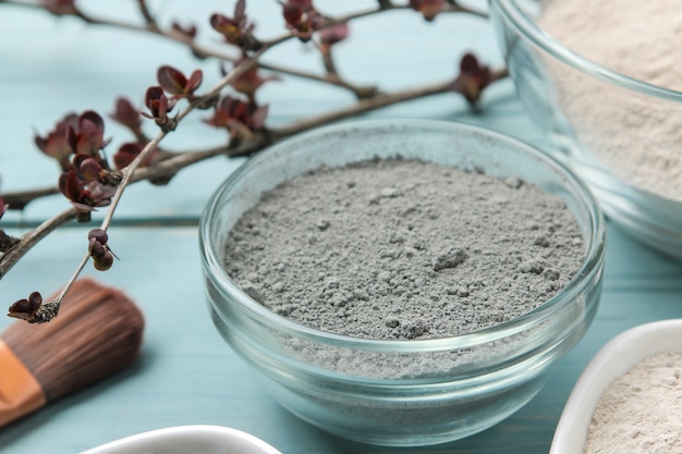 Premium Photo | Cosmetic clay. clay facial mask on a gentle blue ...