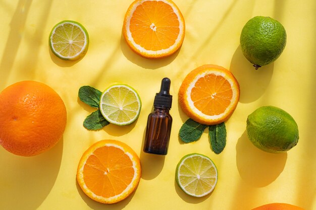 Premium Photo | Cosmetic oil and citrus fruits . cosmetic procedures ...