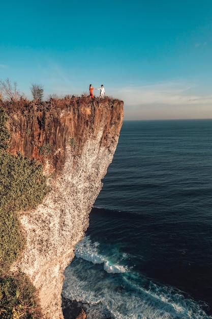 Premium Photo | Couple adventure and looking view on the karang boma ...