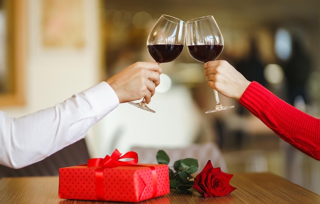 Premium Photo Couple Clink Glasses With Red Wine Lovers Give Each