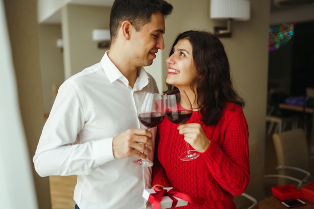 Premium Photo Couple Clink Glasses With Red Wine Lovers Give Each