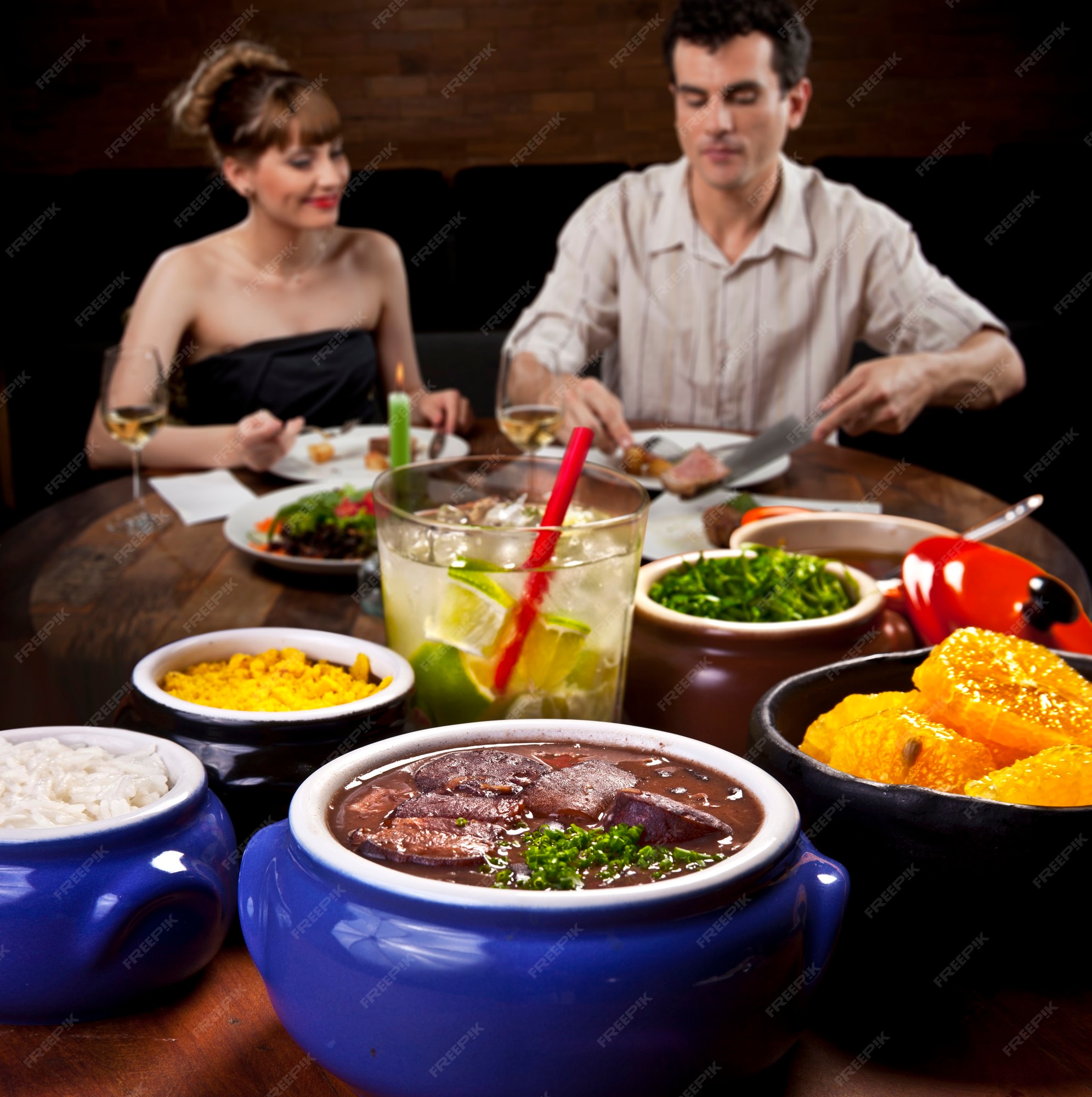 Premium Photo Couple Eating Feijoada At The Restaurant Traditional Brazilian Feijoada With