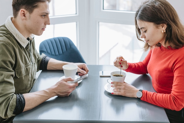 Couple having coffee in a restaurant Free Photo