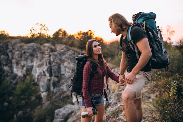 Free Photo | Couple hiking in mountains