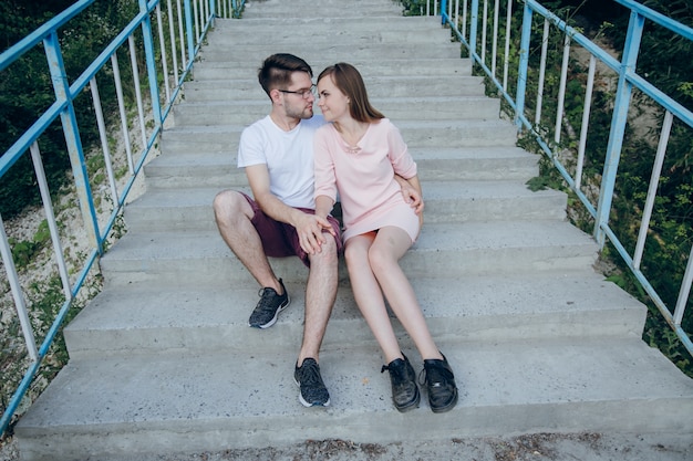 Free Photo Couple Holding Hands Sitting On Stairs