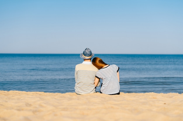 [Image: couple-lovers-sitting-together-beach_149066-2092.jpg]