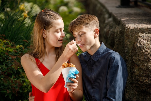 Premium Photo Couple On A Romantic Date Eating Ice Cream