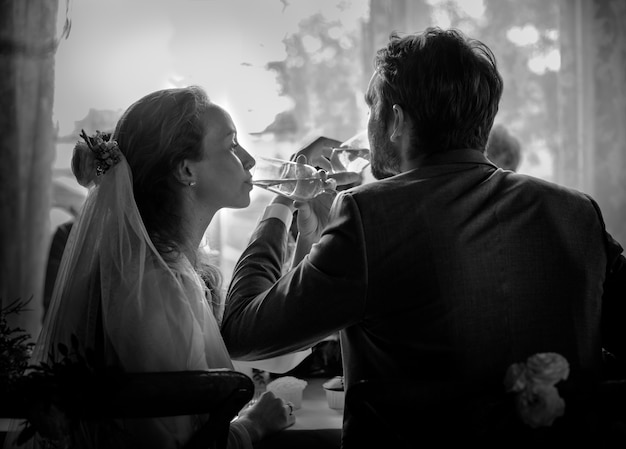 Premium Photo | Couple at the wedding day reception table