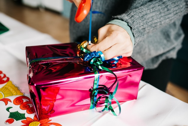 Premium Photo Couple Wrapping Christmas Presents