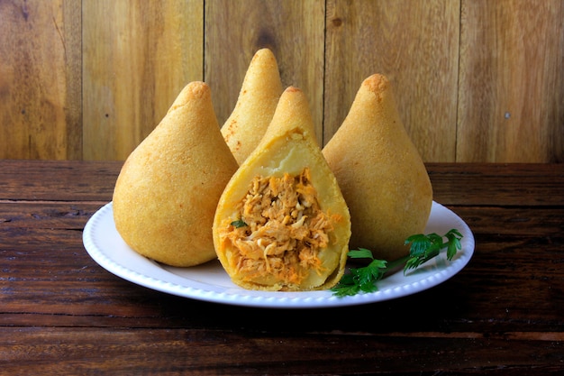 Premium Photo | Coxinha In The Dish, Traditional Brazilian Cuisine ...