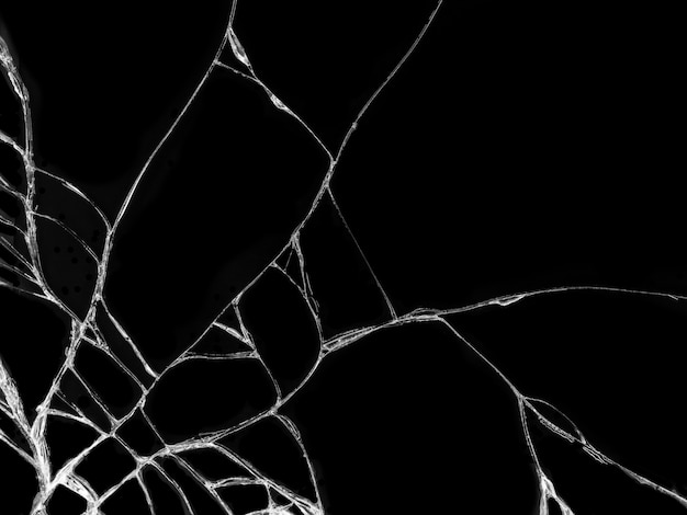 Cracked glass texture on black background | Premium Photo