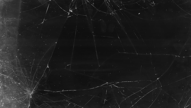 Cracked overlay. broken glass texture. black smashed distressed tablet screen with dust scratches fi