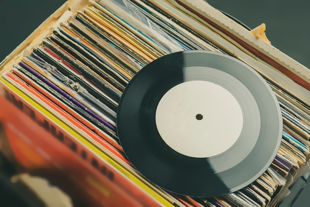 Premium Photo | Crate digging in vinyl record collection b