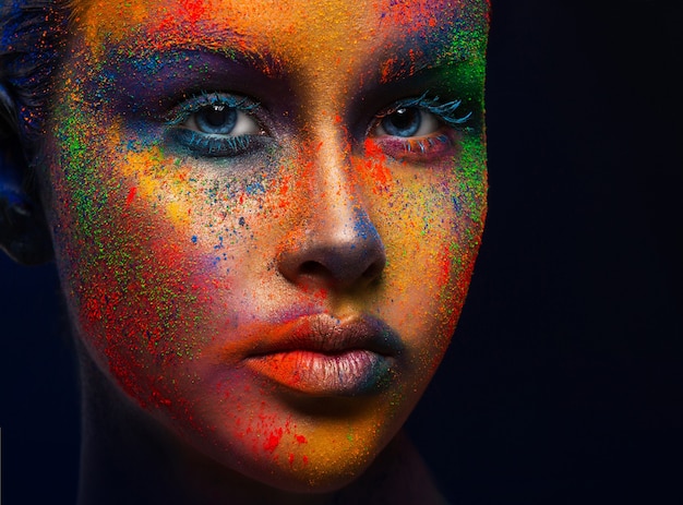 Premium Photo Creative Art Make Up Portrait Of Young Fashion Model With Closed Eyes And Bright Colorful Mix Of Paint On Her Face Color Fantasy Artistic Makeup