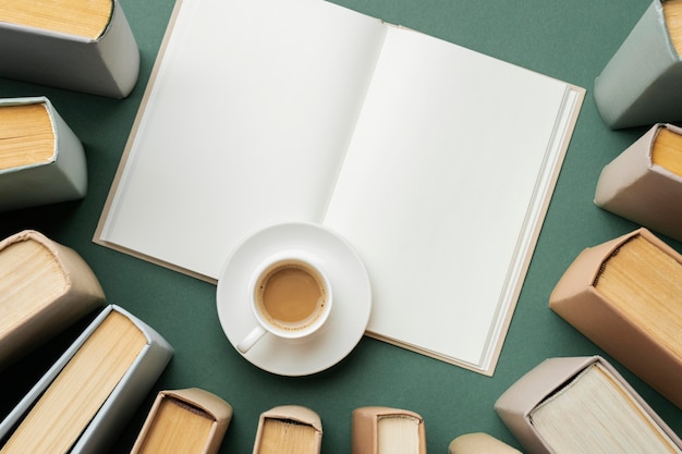 Free Photo | Creative assortment with different books and a cup of cofee