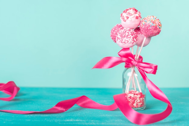 Creative cake pop concept Free Photo