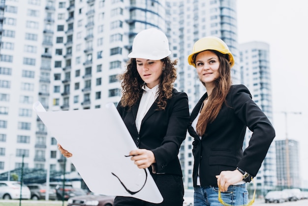 Premium Photo | Creative construction workers planing future outdoors