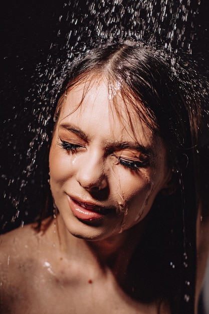 Premium Photo Creative Makeup Theme Non Washable Make Up Portrait Of A Girl Taking A Shower