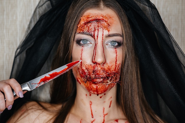 Premium Photo Creepy  bloody  makeup  girls on halloween 