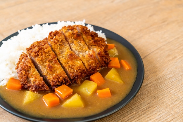 Premium Photo | Crispy fried pork cutlet with curry and rice