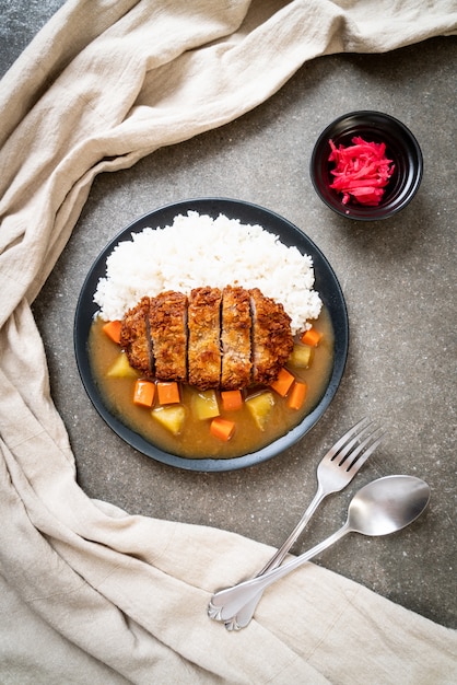 Premium Photo | Crispy fried pork cutlet with curry and rice